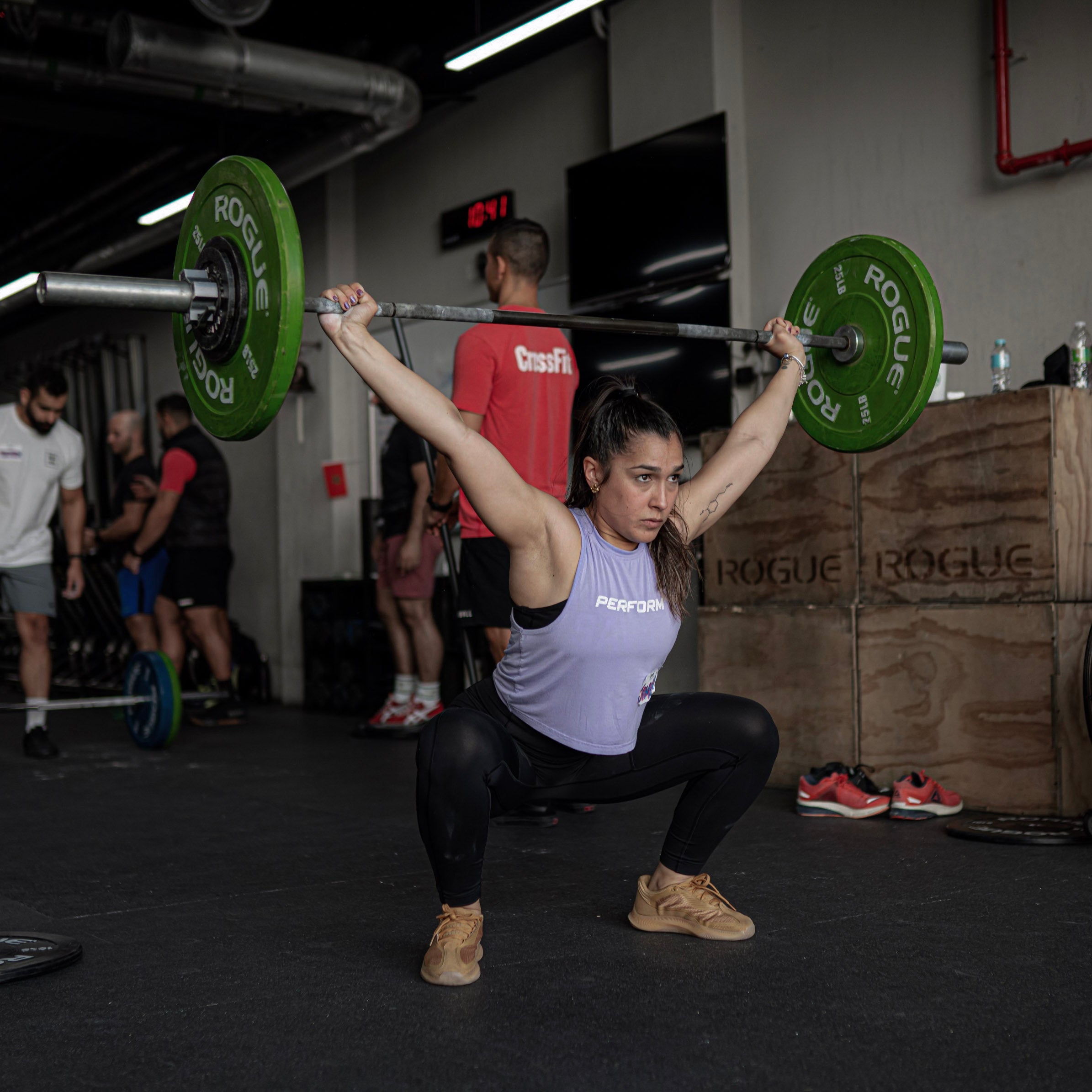 Powerlifting vs. Olympic Weightlifting An Exploration of Two Great St