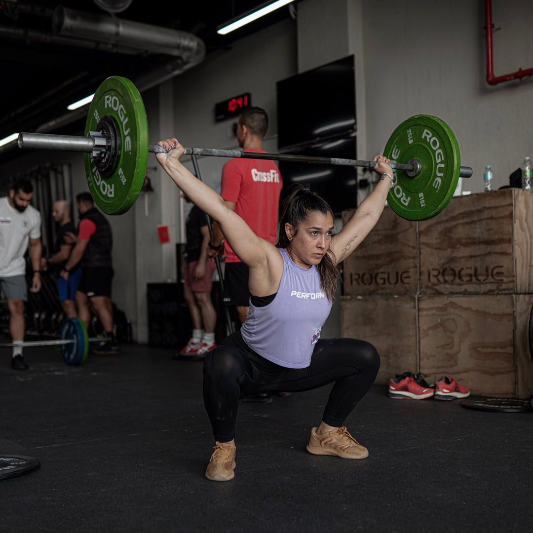 Powerlifting vs. Olympic Weightlifting: An Exploration of Two Great Strength Sports